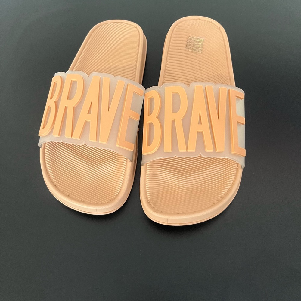 Selling women’s slides size 8, tan colour, original design